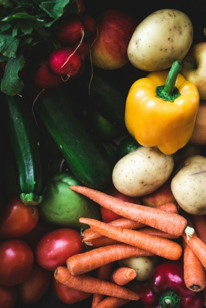 Colourful vegetables rich in vitamins and minerals, including carrots, peppers, and tomatoes