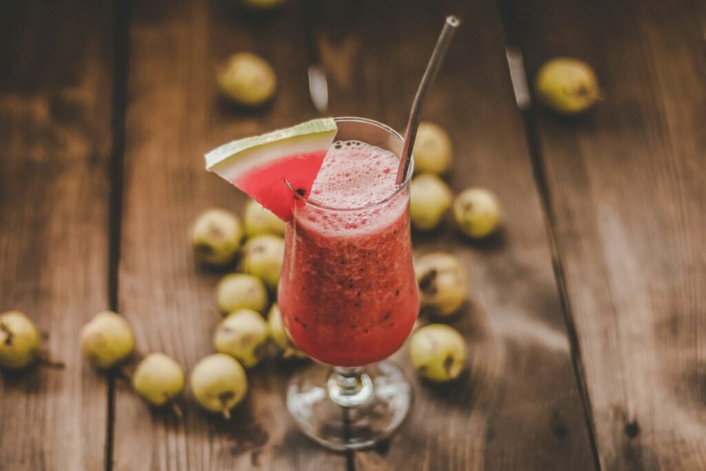 Watermelon juice shake in a glass, made by juicing whole fruit