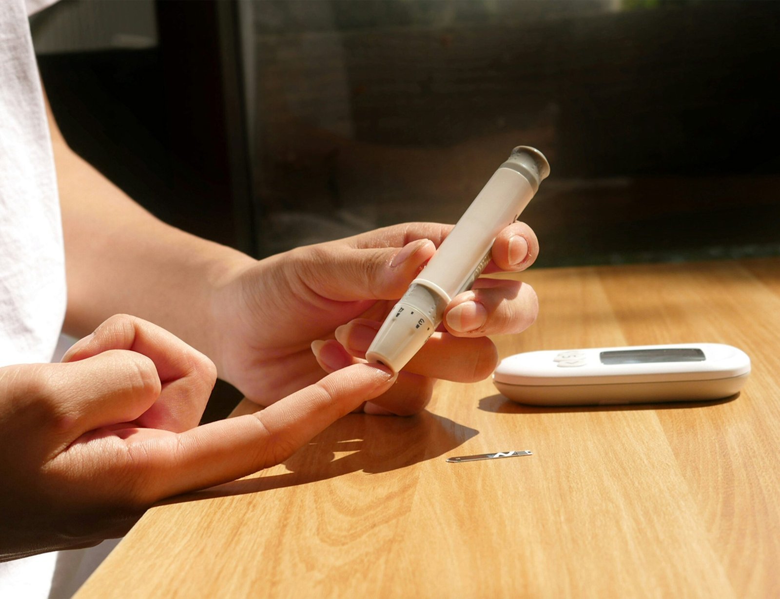 Blood glucose and ketone meter on a table